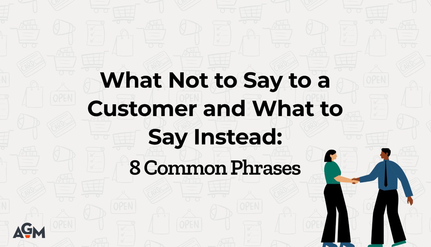 Graphic with a light gray background patterned with shopping-themed icons such as carts, bags, megaphones, and signs. Centered bold black text reads: “What Not to Say to a Customer and What to Say Instead: 8 Common Phrases.” At the bottom right, an illustrated woman and man are shown shaking hands. The AGM logo appears in the bottom left corner.