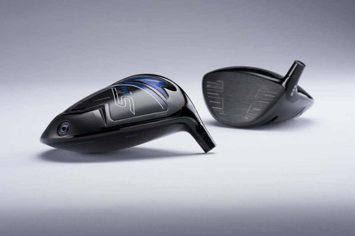Two black Mizuno ST Max 230 golf driver heads displayed on a white surface—one showing the top design with blue accents and branding, the other showing the textured clubface.