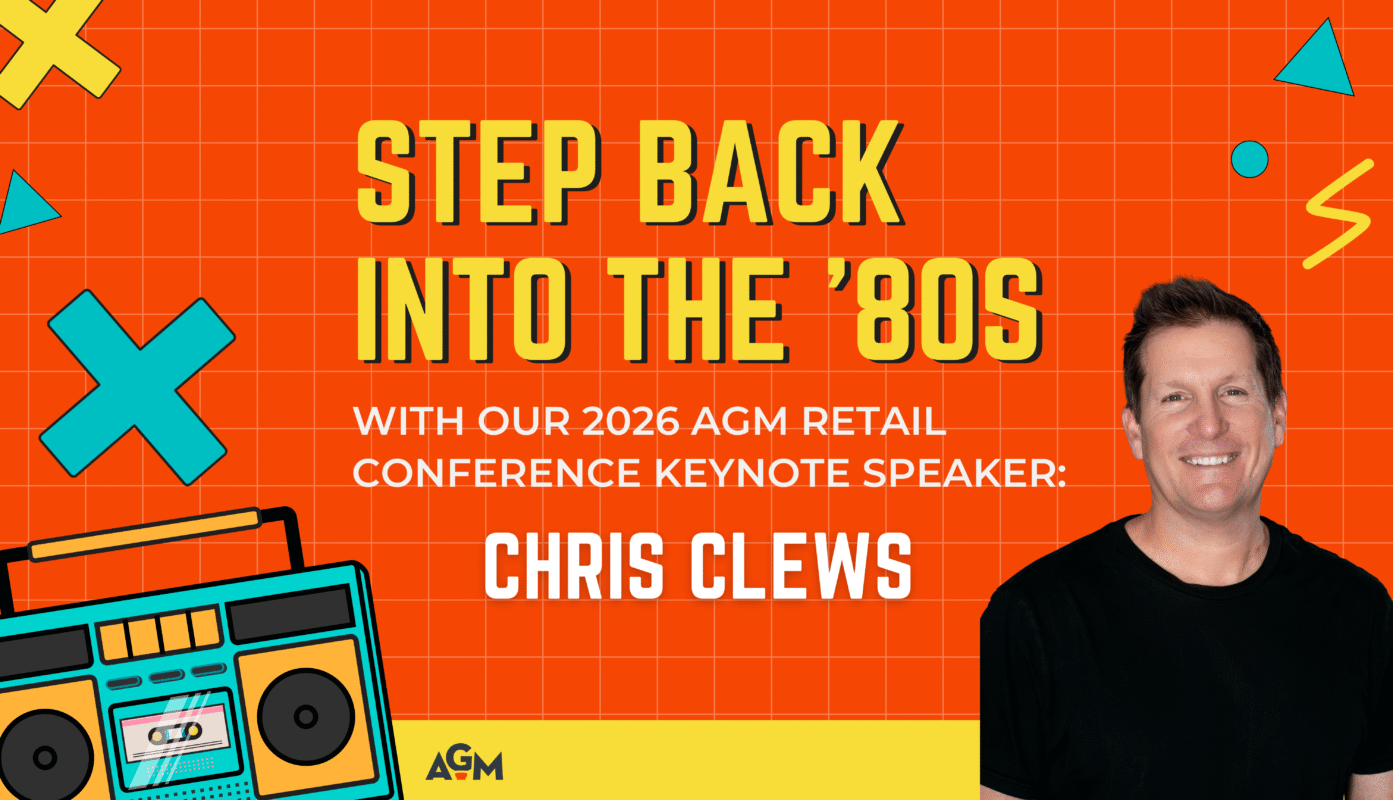 Bright, retro-themed graphic with a red-orange grid background, teal and yellow geometric shapes, and a colorful 1980s-style boombox in the corner. The bold text reads "Step Back Into the ’80s – With Our 2026 AGM Retail Conference Keynote Speaker: Chris Clews." A smiling man in a black t-shirt (Chris Clews) is pictured on the right. AGM logo appears in the bottom yellow bar.