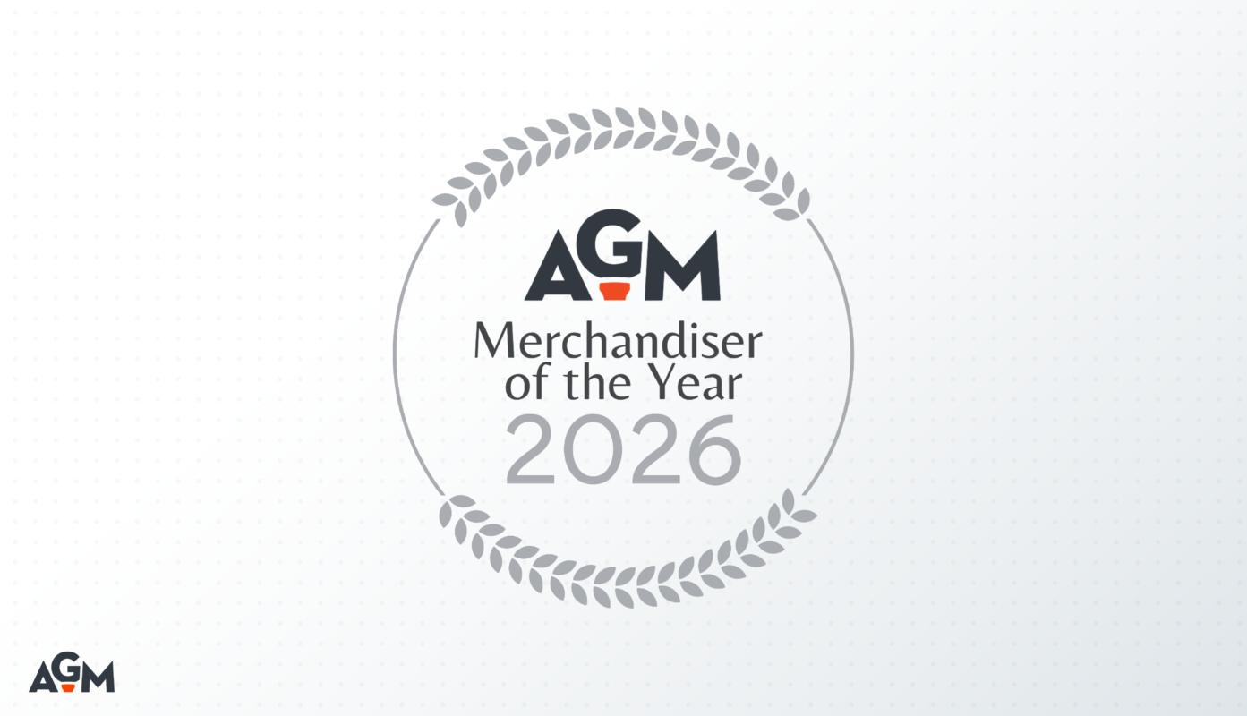 Blog cover image for the 2026 AGM Merchandiser of the Year, featuring the AGM logo centered within a circular laurel wreath. The text “Merchandiser of the Year 2026” appears below the logo on a light gray background with subtle dotted texture.