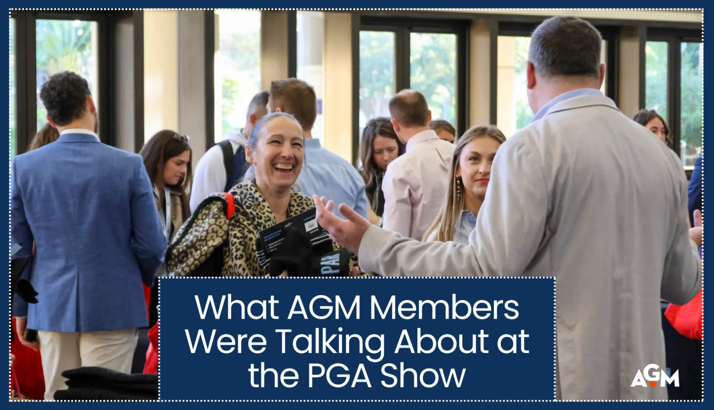 AGM members happily chatting with a sales representative. The blog title “What AGM Members Were Talking About at the PGA Show” is displayed in bold white text on a navy blue box. AGM logo appears in the bottom right corner.