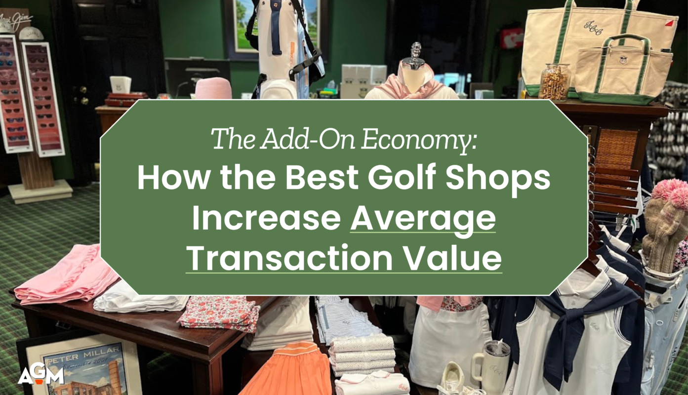 Golf shop interior featuring folded apparel, accessories, and personalized tote bags with a green overlay that reads “The Add-On Economy: How the Best Golf Shops Increase Average Transaction Value.” The scene highlights a visually appealing, add-on-friendly merchandising setup with a Maui Jim sunglass display and Peter Millar framed print in the background. AGM logo appears in the bottom left corner.