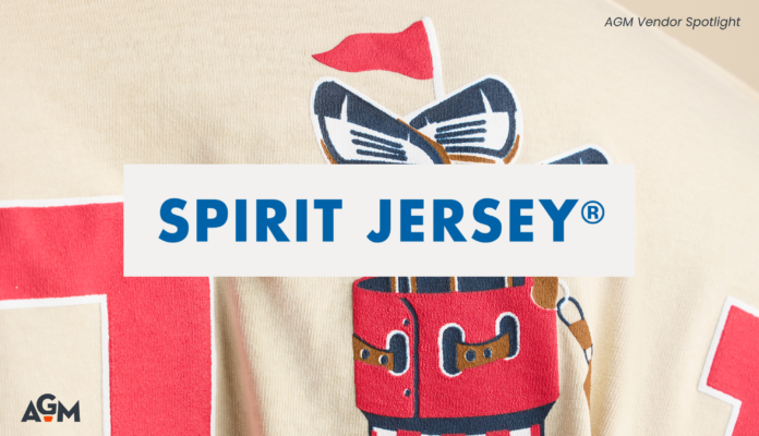 Close-up graphic of a cream-colored golf-themed sweatshirt featuring a red-and-white golf bag illustration, overlaid with a centered “SPIRIT JERSEY®” title banner. “AGM Vendor Spotlight” appears in the top right corner, with the AGM logo in the lower left corner.