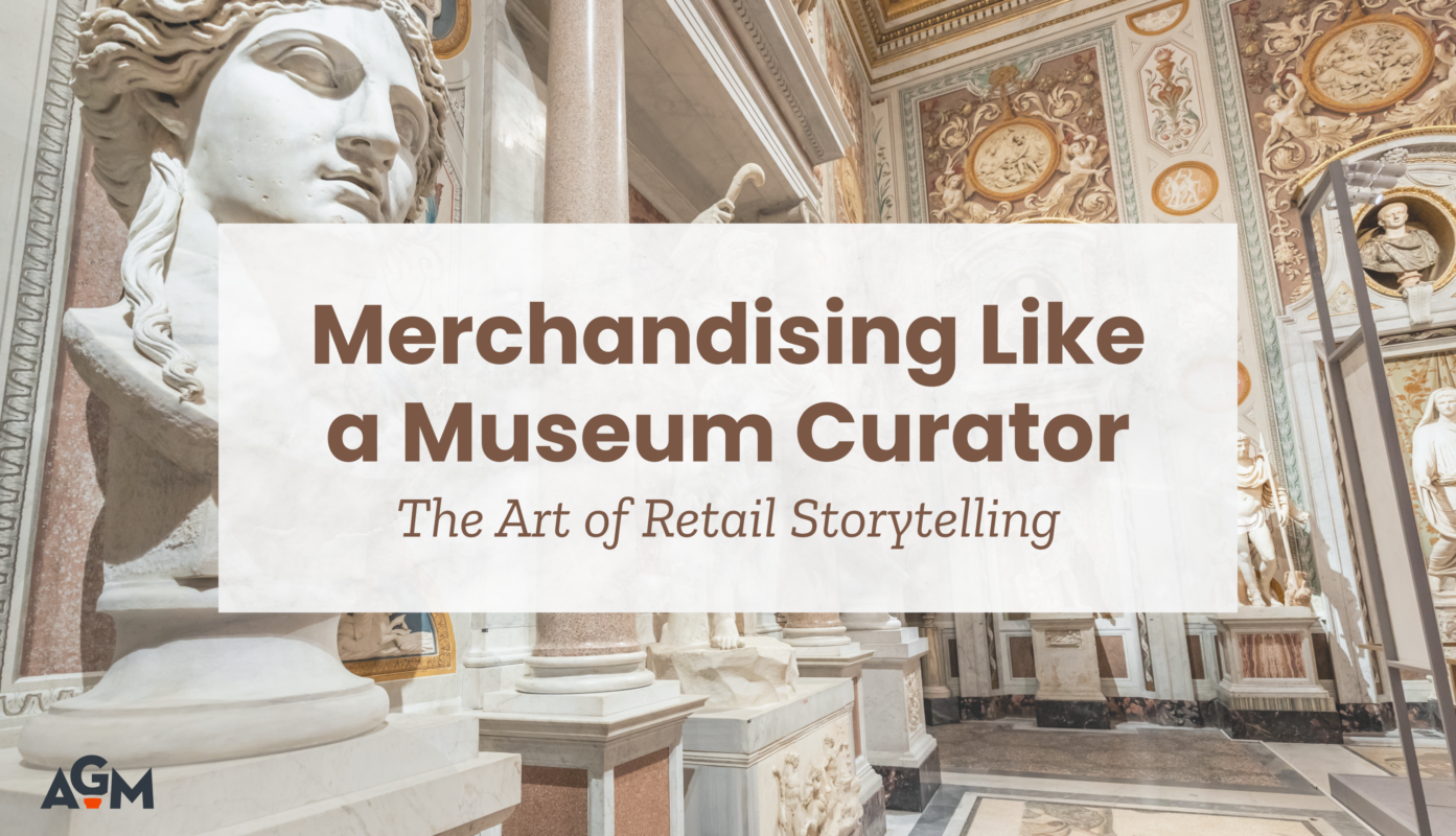 Blog cover graphic featuring the title "Merchandising Like a Museum Curator: The Art of Retail Storytelling" over an image of a classical museum interior with statues, columns, and ornate architectural details. The AGM logo appears in the lower-left corner.