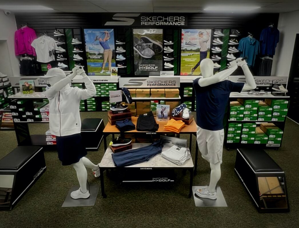 Photo of a Skechers Performance concept shop at Haggin Oaks, featuring golf apparel, footwear, and mannequins posed in golf swings.
